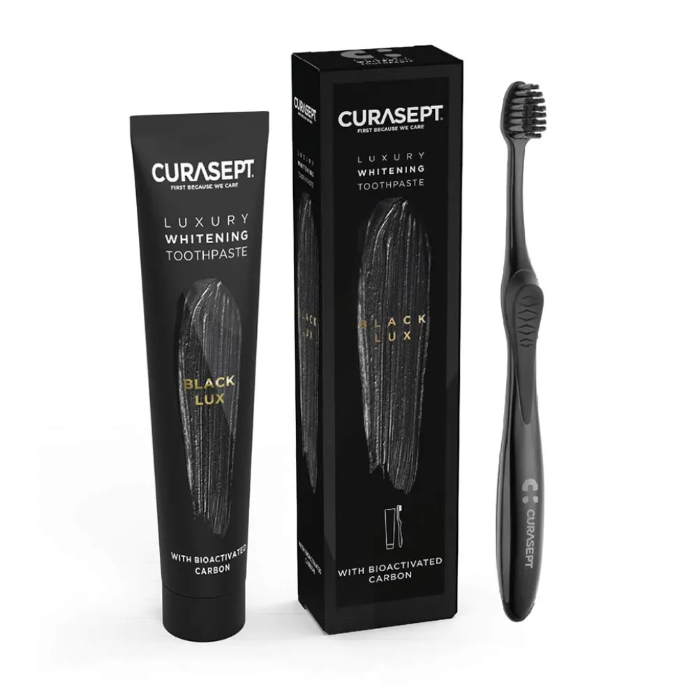 Curasept Black Lux - Kit con dentifricio e spazzolino per lo sbiancamento dentale, 75 ml e 1 pezzo