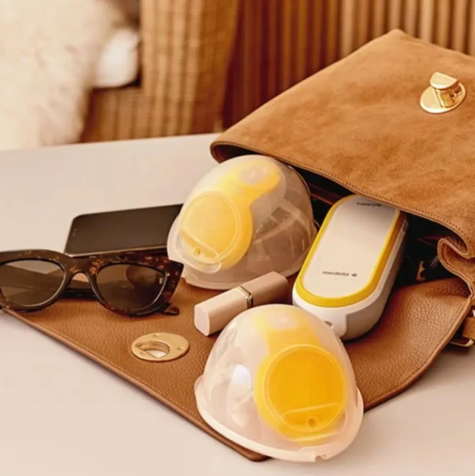 Medela Freestyle Hands-Free - Tiralatte elettrico doppio indossabile per estrarre il latte, 1 kit